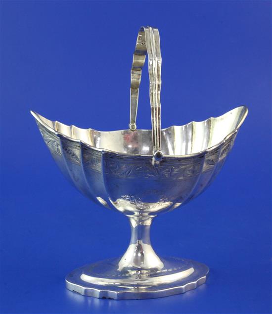 A George III Irish silver boat shaped sugar basket, 10.5 oz.